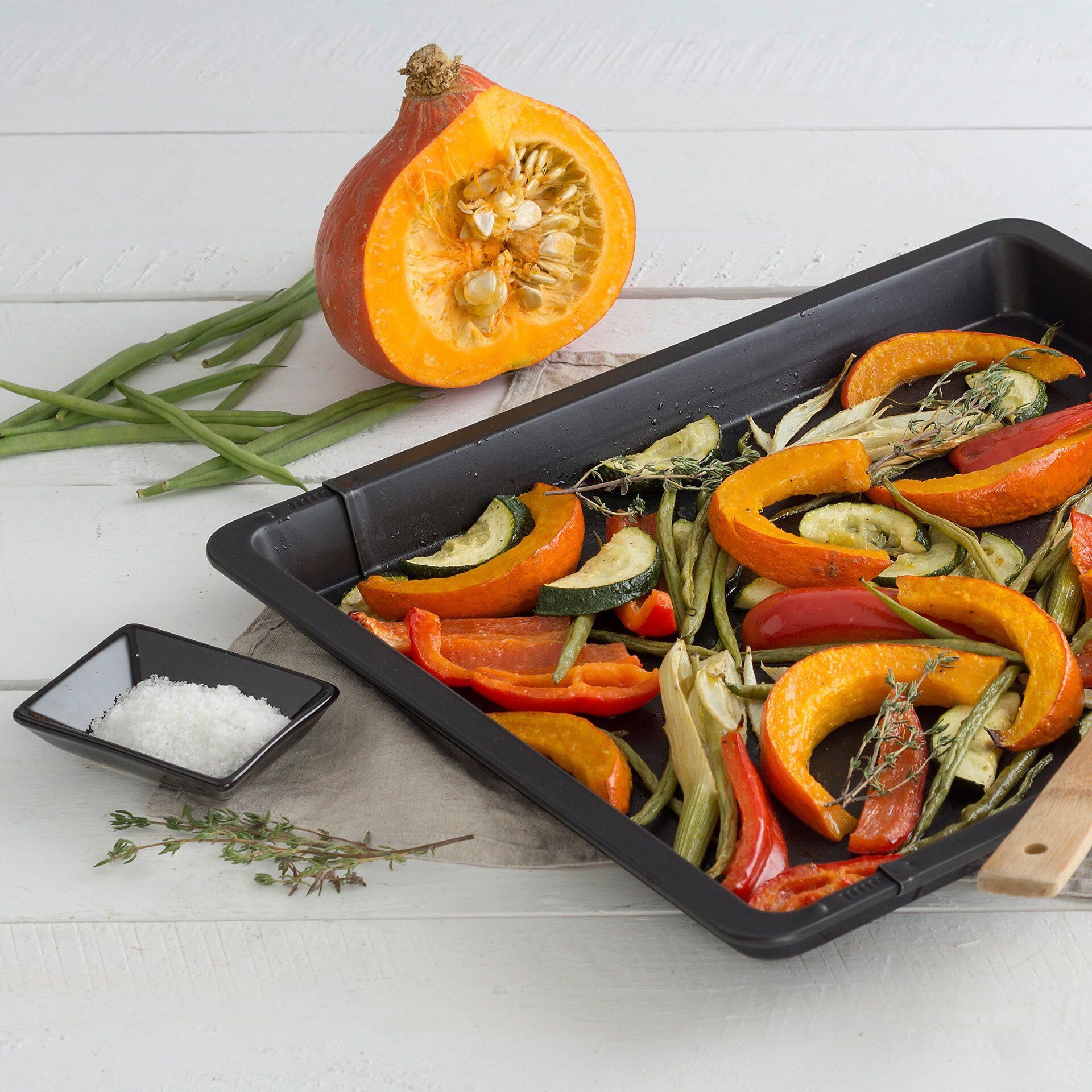 Rozsuwana blaszka do pieczenia z wysokim brzegiem - idealna do pizzy i ciast